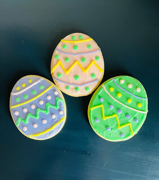 Easter egg cutout cookies with buttercream icing. Colors may vary. (3.25"X4")