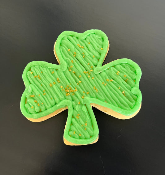 Shamrock cutout cookies with buttercream icing. Colors may vary.(4"X4")