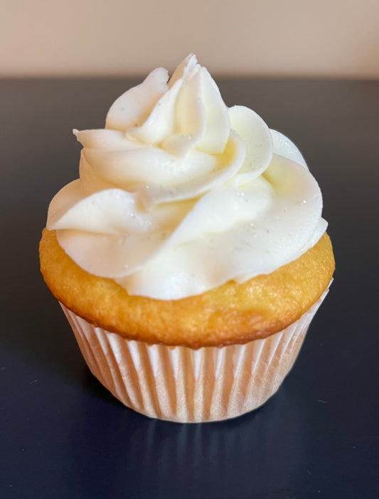 Vanilla - A richly flavored vanilla cake with buttercream icing. Speciality option - filled with icing.