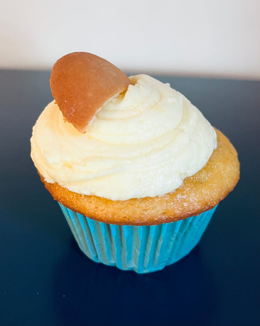 Banana Pudding - A banana flavored cupcake with buttercream icing, topped with a vanilla wafer.  Speciality option - filled with banana pudding
