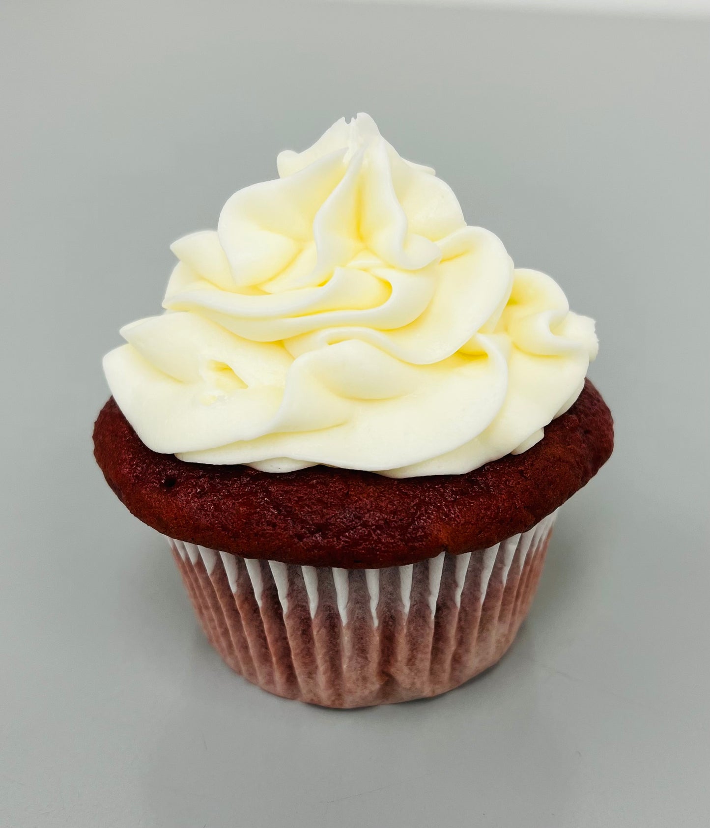 Red Velvet - A mild, moist cocoa flavored cake with cream cheese icing. Speciality option - filled with cream cheese.