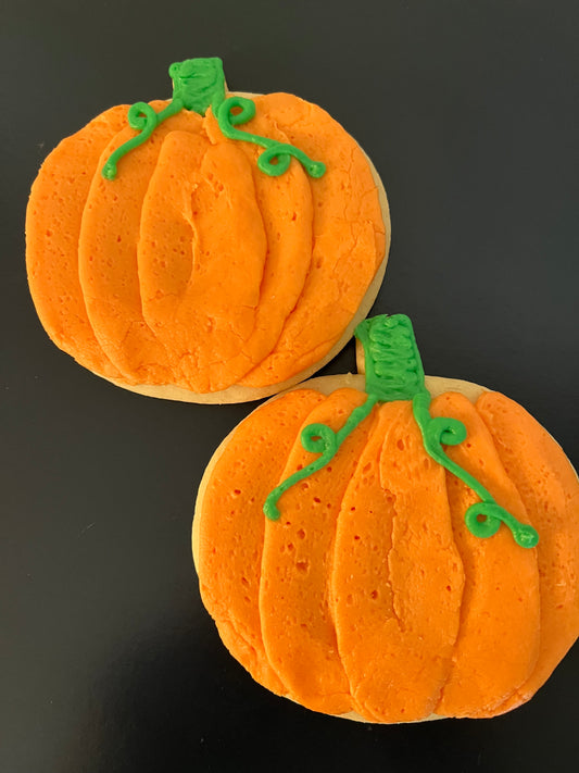 Pumpkin cutout cookies with buttercream icing. (4"X4")
