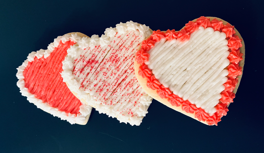 Valentine's Day Heart Cutout Cookies with buttercream icing. (4"X4")